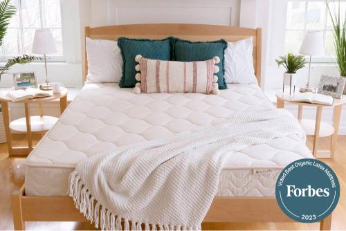 Spindle Mattress in bedroom with seal voted best latex mattress by Forbes